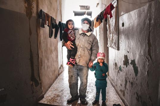 Father with his two children in Syria